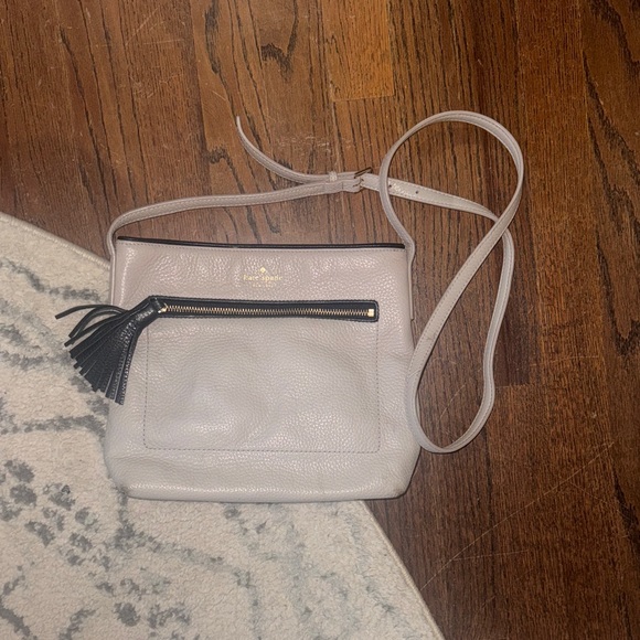 kate spade Handbags - Kate Spade Cream Crossbody Bag with Tassel